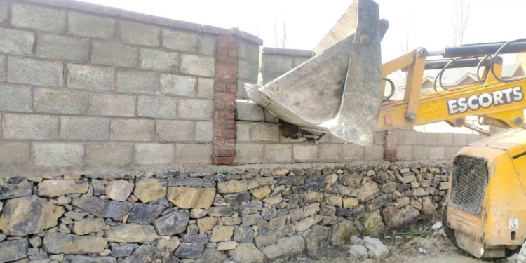 Friends Enclave: Outer wall of former bureaucrat’s residence, who had ‘grabbed’ state land, demolished